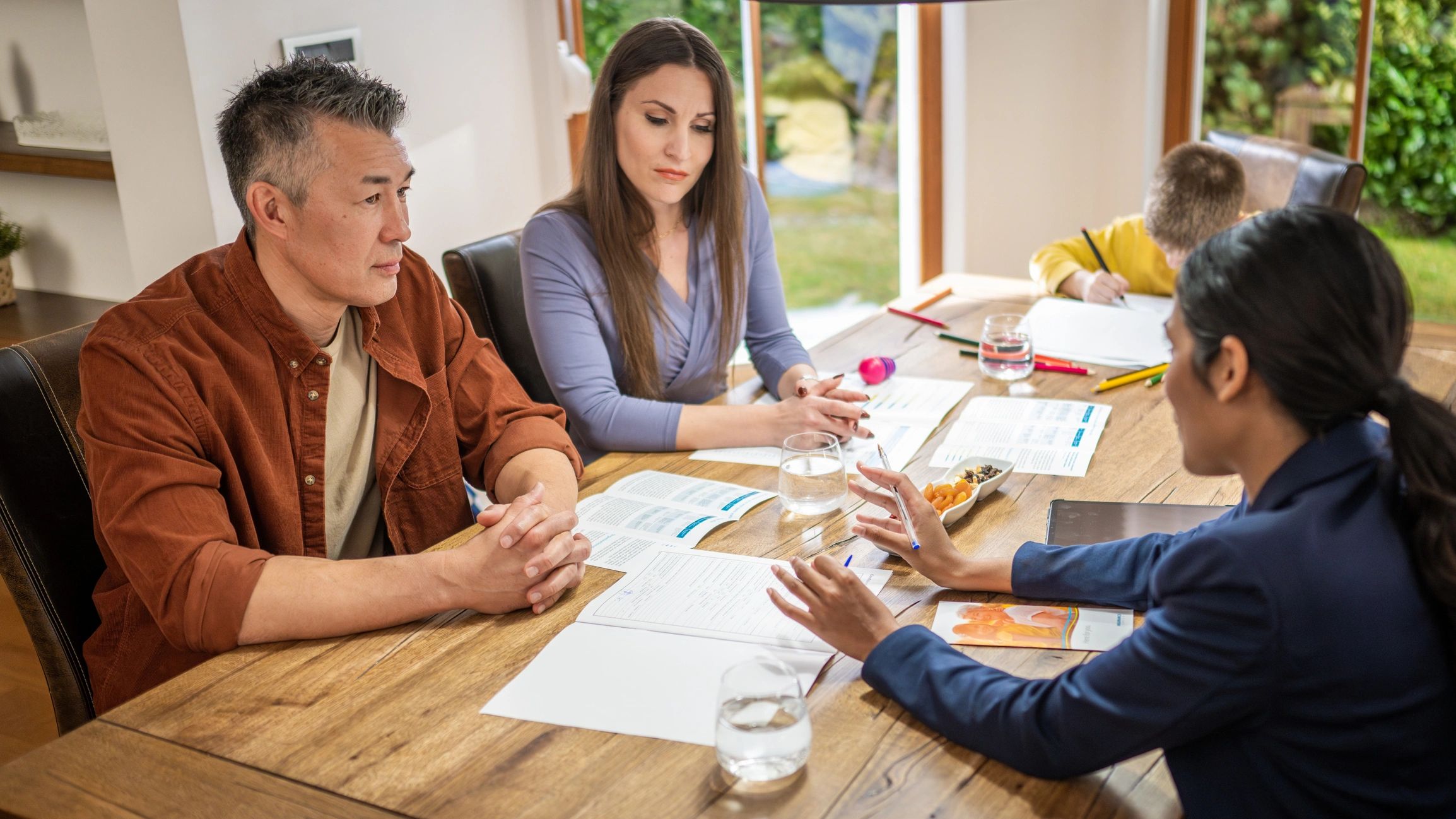 Clients meeting with a mortgage advisor